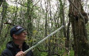 Volunteers learned how to use tracking equipment by finding a toy bat in a roost